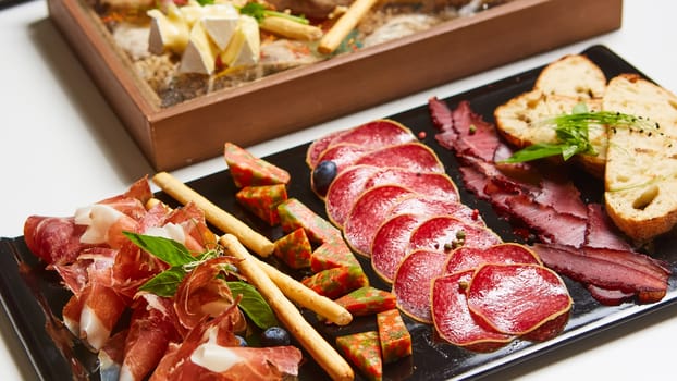 Antipasto Platter Cold meat plate with grissini breadsticks