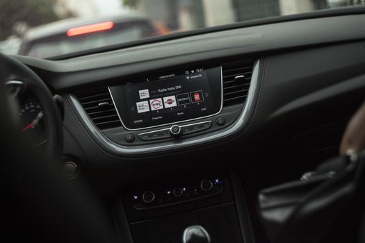 Dashboard of a modern car with screen and buttons