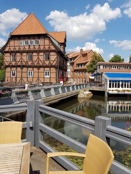 Half-timbered red brick houses near the river on the old harbor Lueneburg, Germany