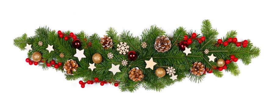 Christmas Border frame sripe of tree branches isolated on white background , red and wooden decor, berries, stars