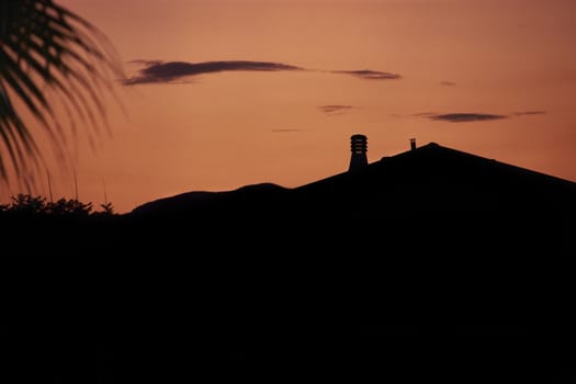 Silhouette of houses at sunset in Sicily