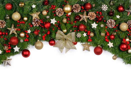 Christmas Border frame of tree branches on white background with copy space isolated, red and golden decor, berries, stars