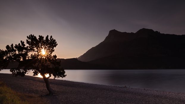 Panoramic image of the Waterton Lake at sunrise, Waterton Lakes National Park, Alberta, Canada
