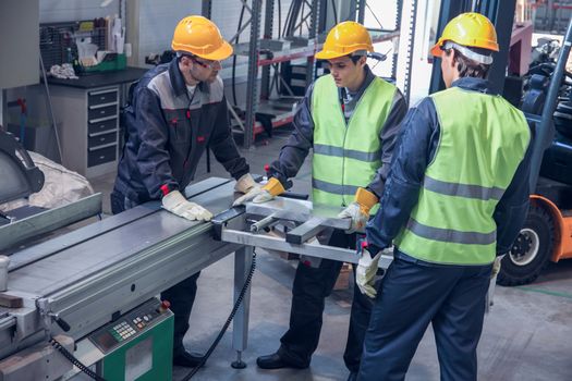 CNC machine shop with lathes, technicians and workers