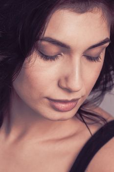 Close up fashion portrait of beautiful mid adult woman