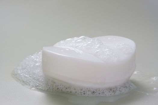 Nice wet white soap bar with foam wash