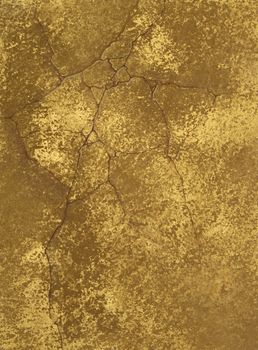 texture of a cement wall covered metallic paint, with gold spots.
