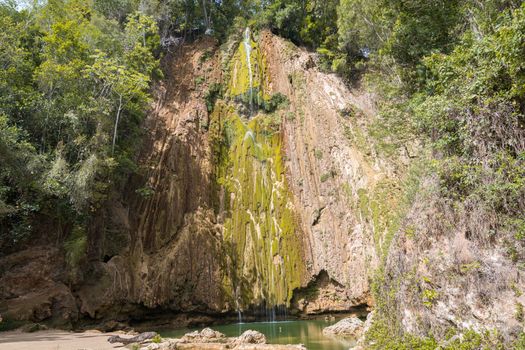 Panorama of the wonderful El Limon tropical waterfall with a lot of moss and steaming water, looks under the waterfall in the Dominican republic of the samana peninsula.