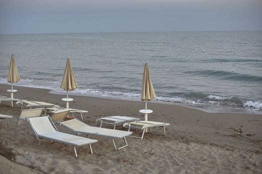 Umbrellas by the sea in a Siclian Beach in Marina di Butera