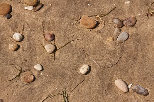 Pebbles on Sand in a beach in Sicily