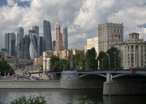 Russia, Moscow, Center of City View on River, Bridge and Buildings of Different Styles.