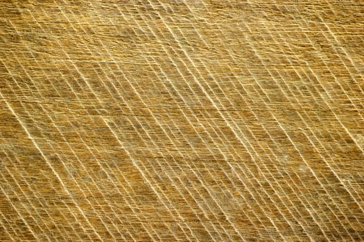 Texture of the saw on real natural brown wood.
