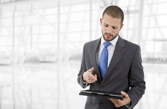 businessman using touch pad of tablet pc, at the office