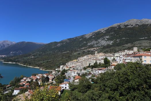 Barrea, Italy - 12 October 2019: Lake Barrea and the mountain village