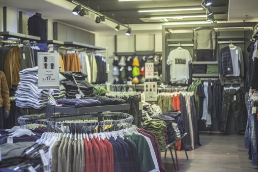 Interior of a clothing store with many tipes of dresses