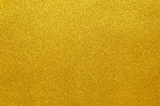 Gold sparkling festive background, close-up. Copy space for text. Horizontal. Celebration, holidays, sales, fashion concept, harvesting for mock up.