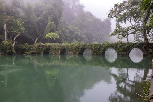 The famous ancient bridge (small seven-holes bridge) of Lobo in Guangxi, China.