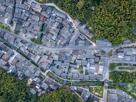 The bird's eye view of the traditional Dong village of Zhaoxing in Guizhou, China. The Chinese character in the photo is the name of Dong Village.