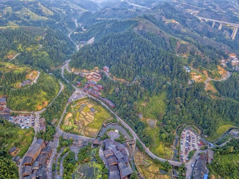 The bird's eye view of the traditional Dong village of Zhaoxing in Guizhou, China. The Chinese character in the photo is the name of Dong Village.