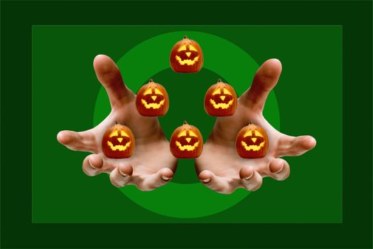 Actor 's hands juggle little pumpkin, entertaining people at Halloween holiday