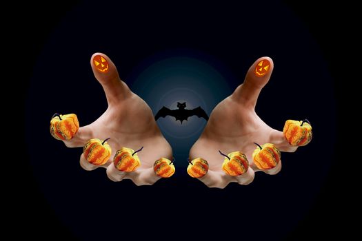 The actor 's hands are decorated with a small pumpkin and stickers that fun people at Halloween holiday