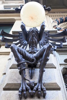 Turin, Italy. Mysterious Giant Gargoyle Lamp in public street, dated around 1850