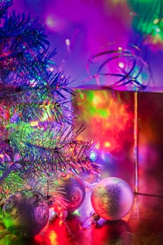 Christmas still life of Christmas trees, balloons, gift boxes, lights garland