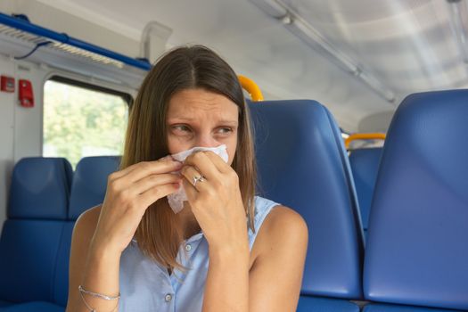 Allergic reaction in a girl in an electric train car