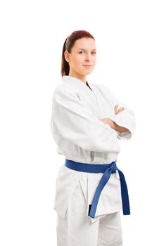 A portrait of a beautiful young girl in a white kimono with arms crossed in front of her, isolated on white background.