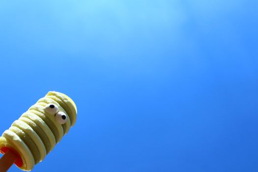 The picture shows a funny ice cream and the blue sky.