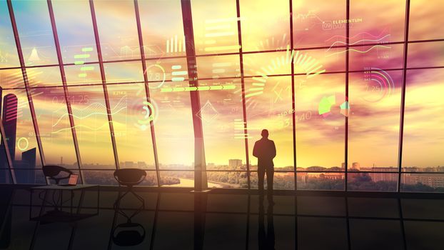 Silhouette of a man in front of an infographic in a sunset-lit office.