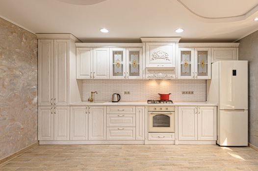Simple and luxury modern white beige kitchen interior
