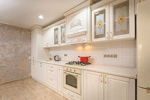 Simple and luxury modern white beige kitchen interior