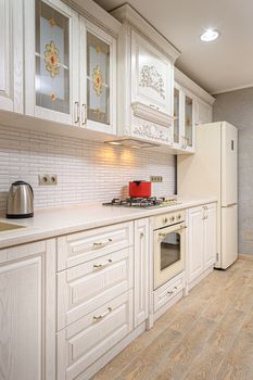 Simple and luxury modern white beige kitchen interior