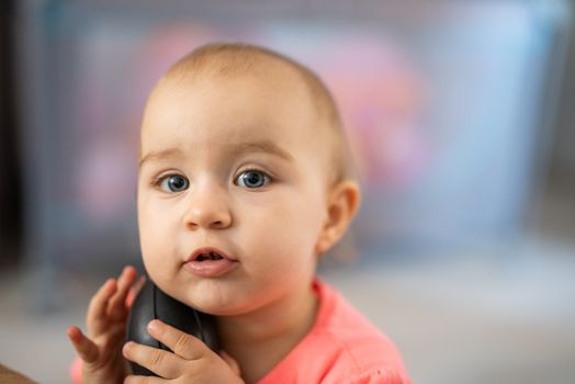 Portrait of adorable baby girl. Childhood. Authentic image