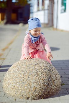 Adorable girl having fun on beautiful autumn day. authentic childhood image
