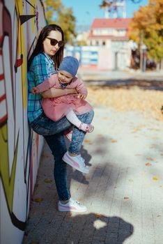 Adorable girl having fun on beautiful autumn day. authentic childhood image