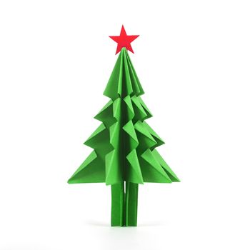 Origami Christmas tree of green craft paper isolated on white background