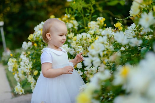 Smiling girl on the meadow looking right at camera. authentic image