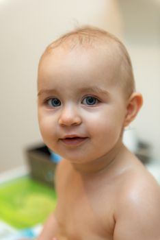 Portrait of adorable baby girl. Childhood. Authentic image