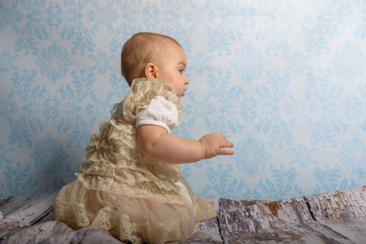 Portrait of adorable baby girl. Childhood. Authentic image