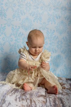Portrait of adorable baby girl. Childhood. Authentic image