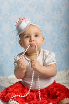 Portrait of adorable baby girl. Childhood. Authentic image
