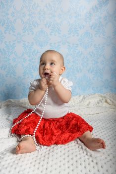 Portrait of adorable baby girl. Childhood. Authentic image