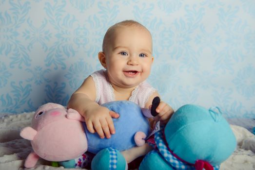 Portrait of adorable baby girl. Childhood. Authentic image