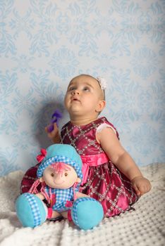 Portrait of adorable baby girl. Childhood. Authentic image