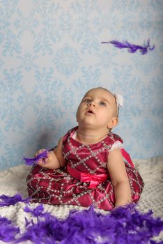 Portrait of adorable baby girl. Childhood. Authentic image