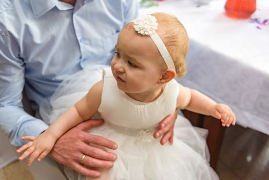 Portrait of adorable baby girl. Childhood. Authentic image