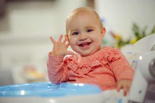 Portrait of adorable baby girl. Childhood. Authentic image
