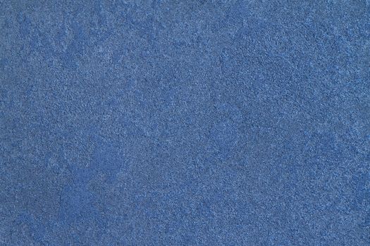 texture  of the painted  stone  wall, blue with sparkles 